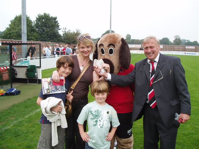 Glass World Gamble winning family (can you spot the Play Off Final mascot?)